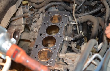 Замена клапанов и ремня и роликов ГРМ Рено Логан K4M