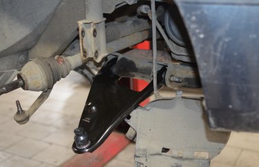 Передний рычаг Рено Логан